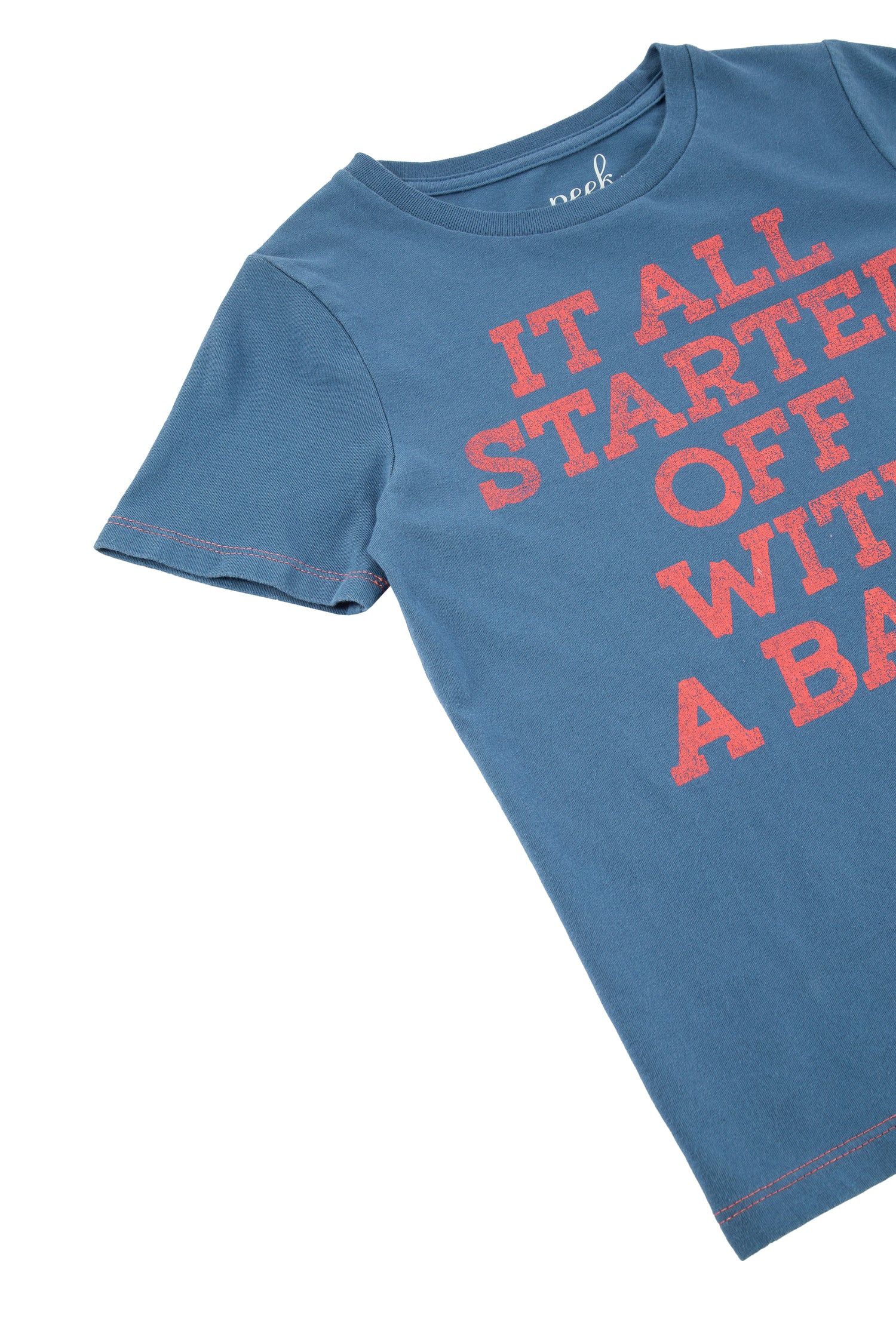 Close up of blue t-shirt with red "it all started off with a bang!" text