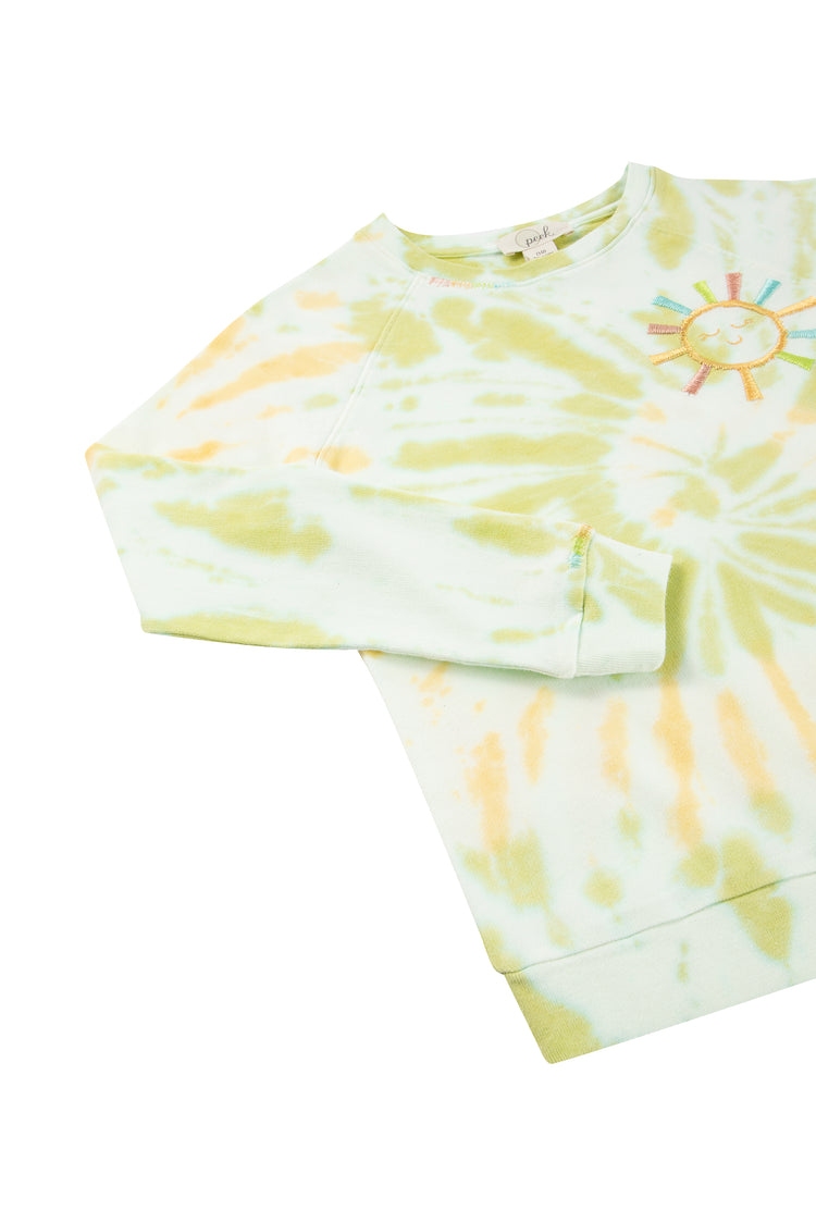 Close up view of yellow and green tie dye sweatshirt 