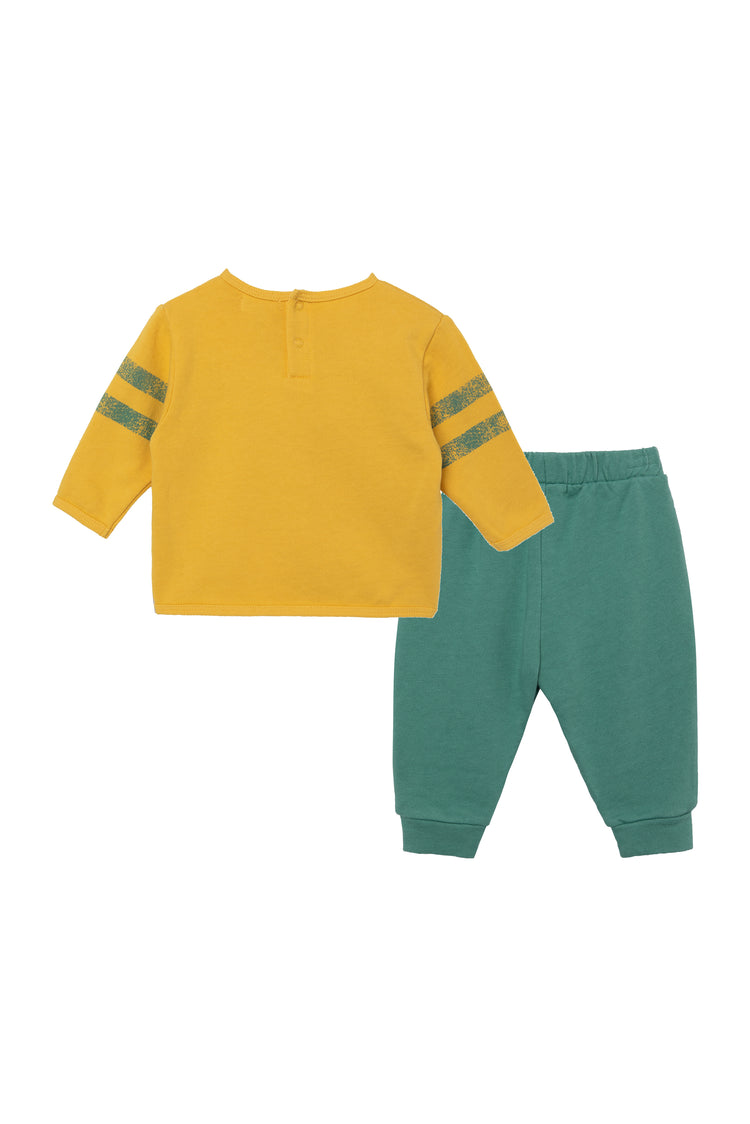 Back view of yellow and green pant and shirt set