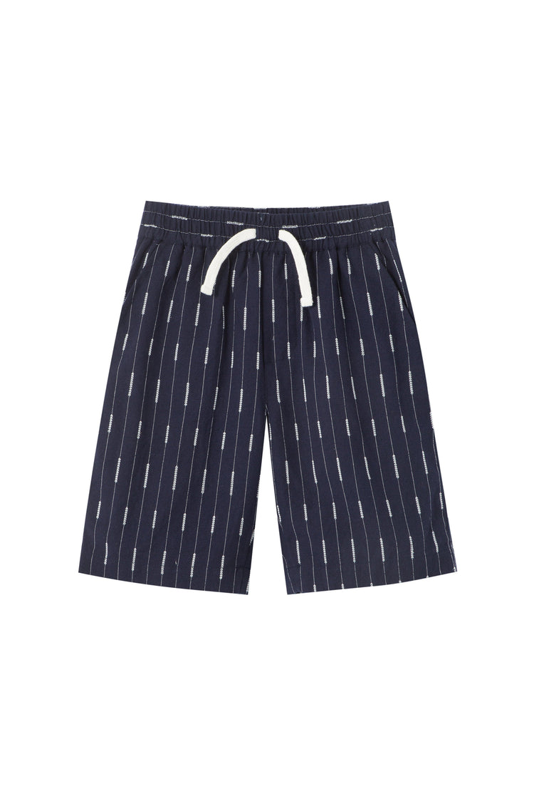 Navy blue elastic waist pull on shorts with Faux drawstring and embroidered white stripes.