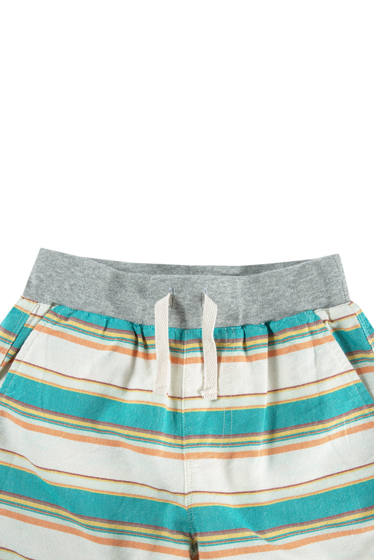 Close up of blue, yellow, red striped shorts with elastic waist and faux drawstring.