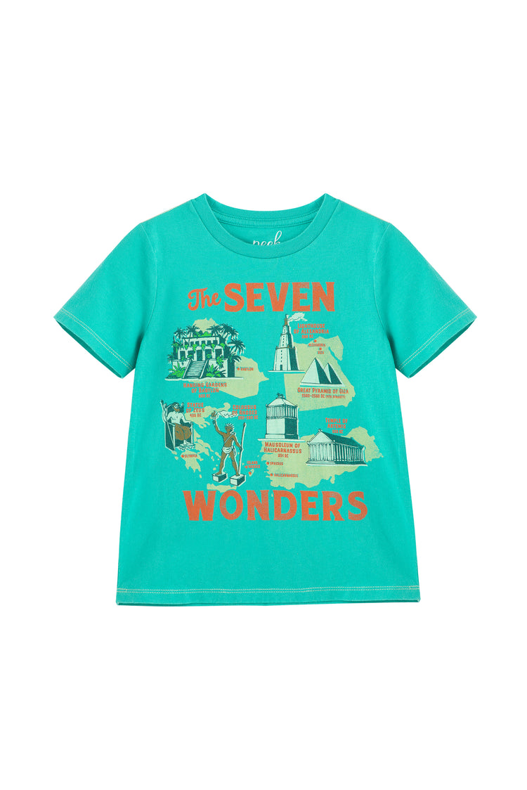 Turquoise t-shirt with orange 'the seven wonders' text