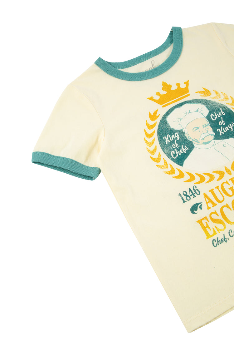 Close up of white and baby blue t-shirt with August Escoffier text and taglines