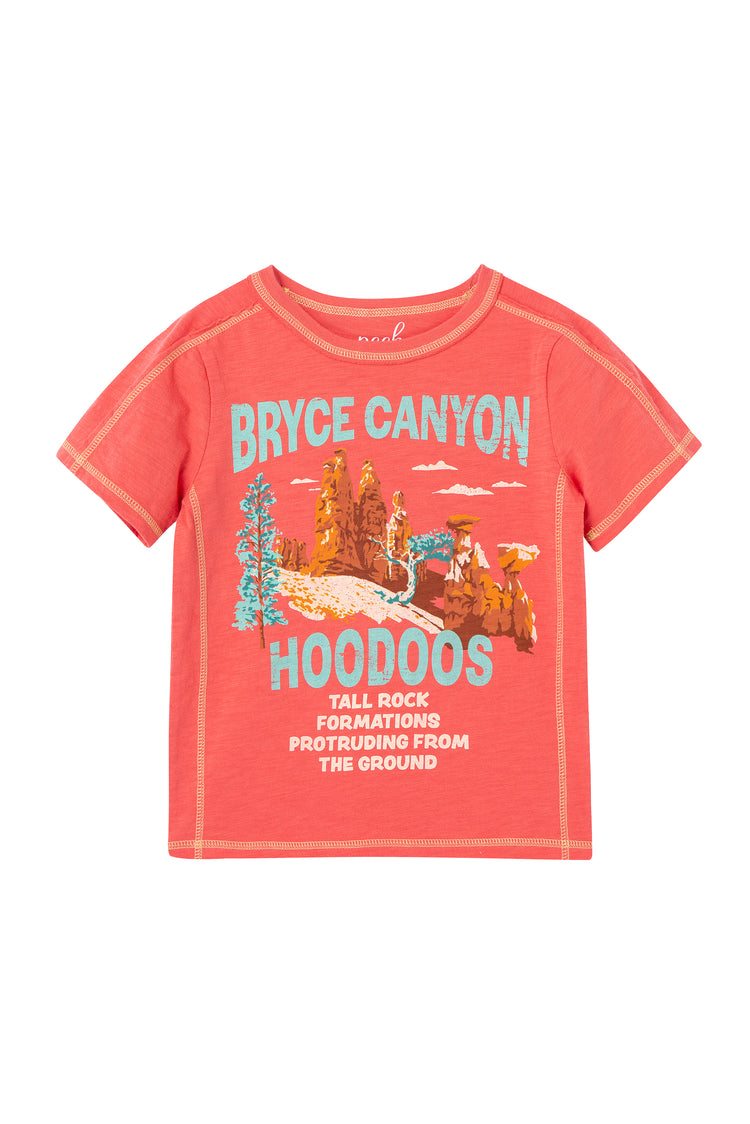 RED T-SHIRT WITH MOUNTAIN GRAPHICS AND THE WORDS "BRYCE CANYON HOODOOS TALL ROCK FORMATIONS PROTRUDING FROM THE GROUND"