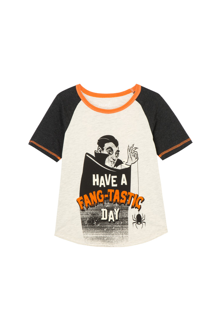 WHITE RAGLAN TEE WITH BLACK SLEEVES AND ORANGE AND BLACK VAMPIRE THEMED HALLOWEEN GRAPHIC THAT READS "HAVE A FANG-TASTIC DAY"