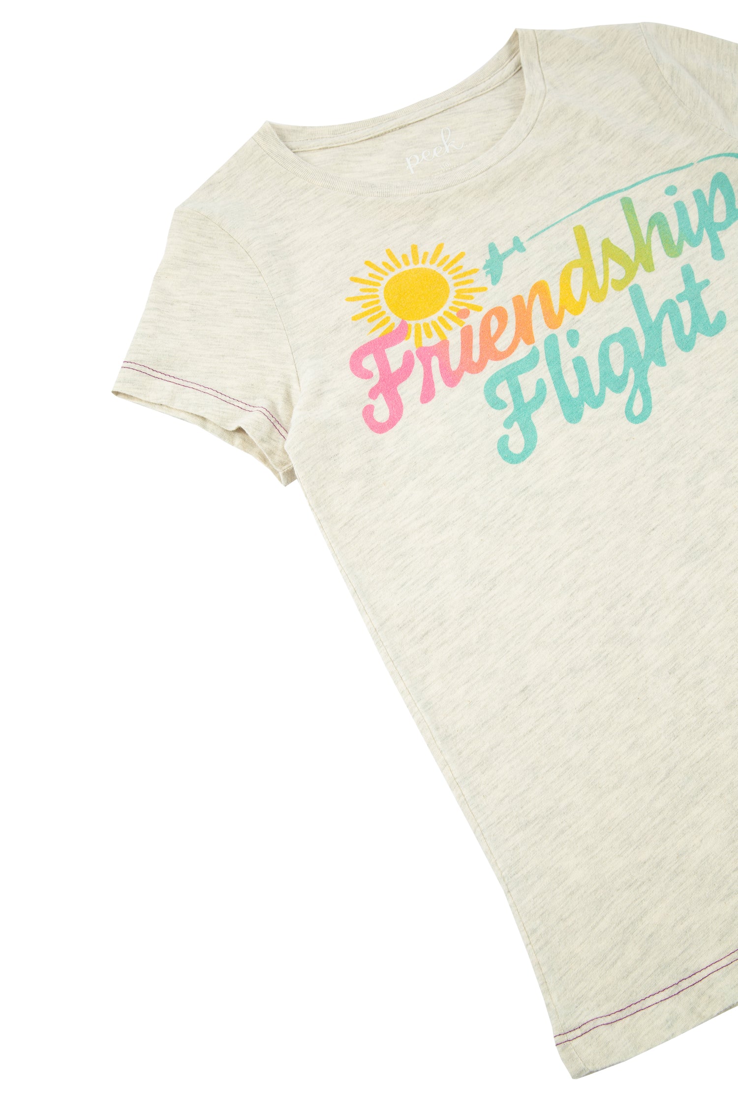 Close up of gray t-shirt with illustrated sun and multi-colored 'friendship flight' text