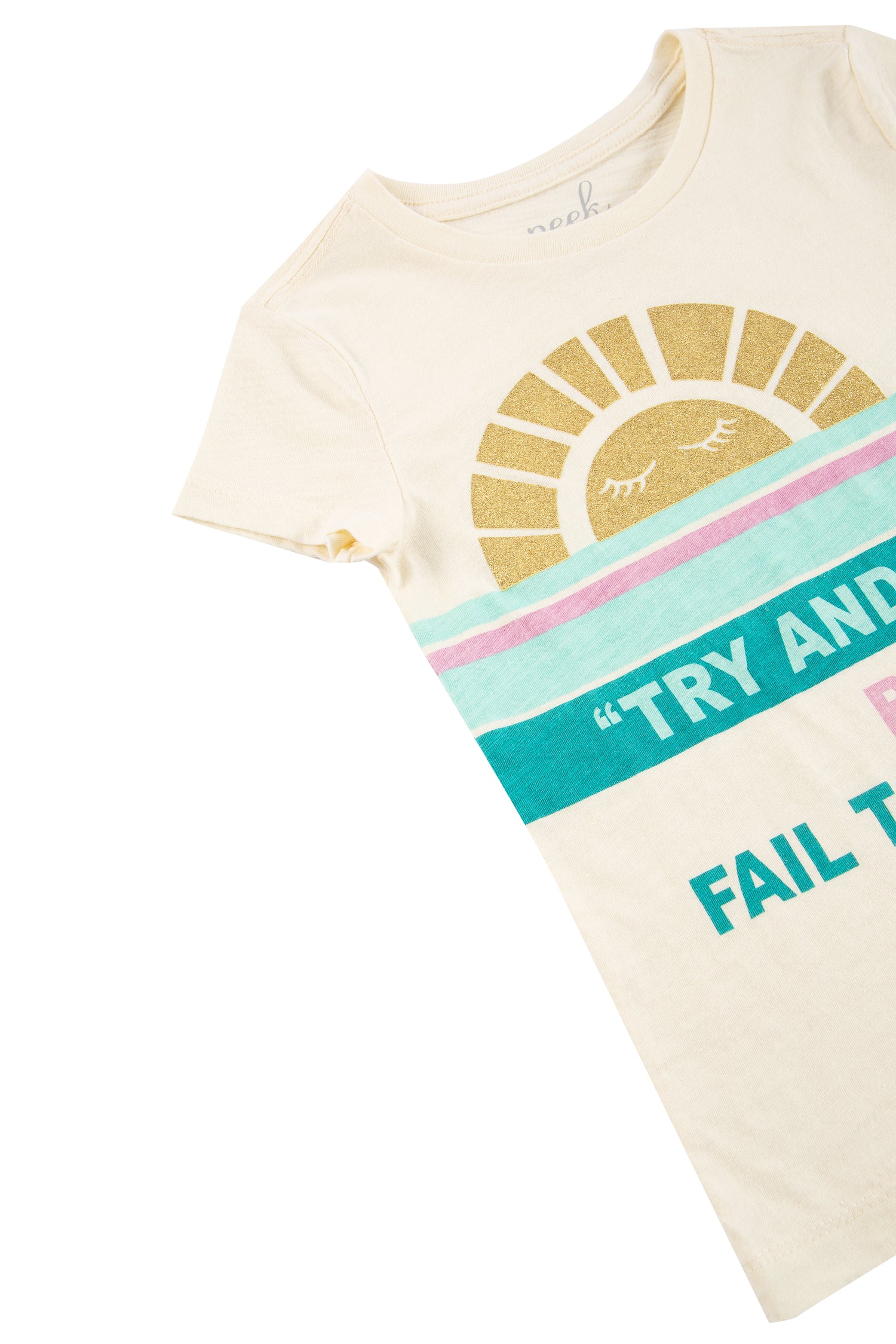 CLOSE UP OF PALE YELLOW T-SHIRT WITH GREEN STRIPES ACROSS THE CENTER, A SUN GRAPHIC AND "TRY AND FAIL BUT DON'T FAIL TO TRY"