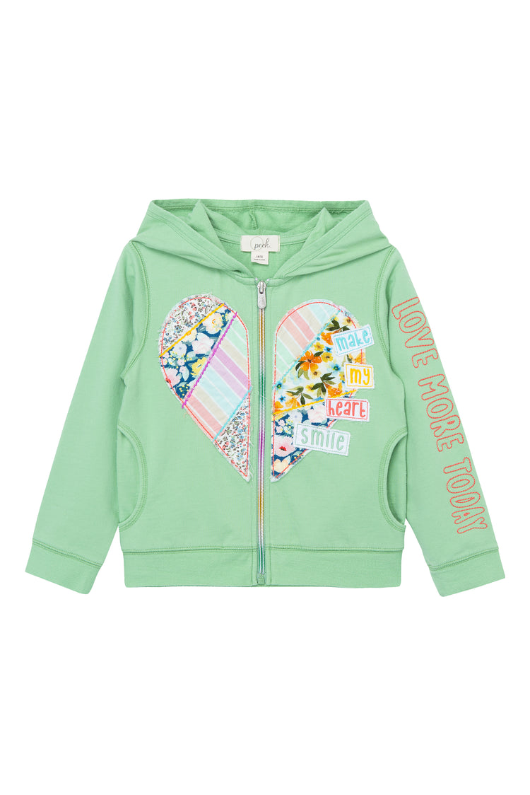 Green hoodie with front zipper, patched heart on front with text "make my heart smile," and text "love more today" on sleeve