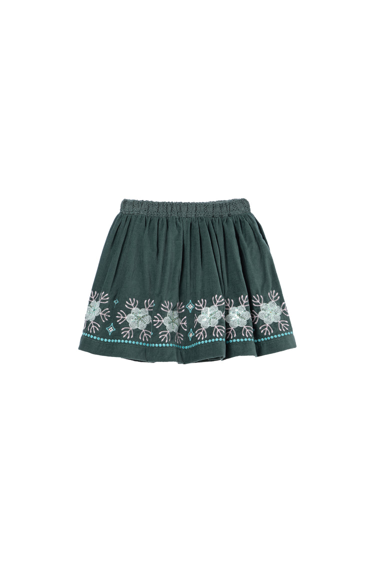 Front view of green velvet skirt with floral detail 