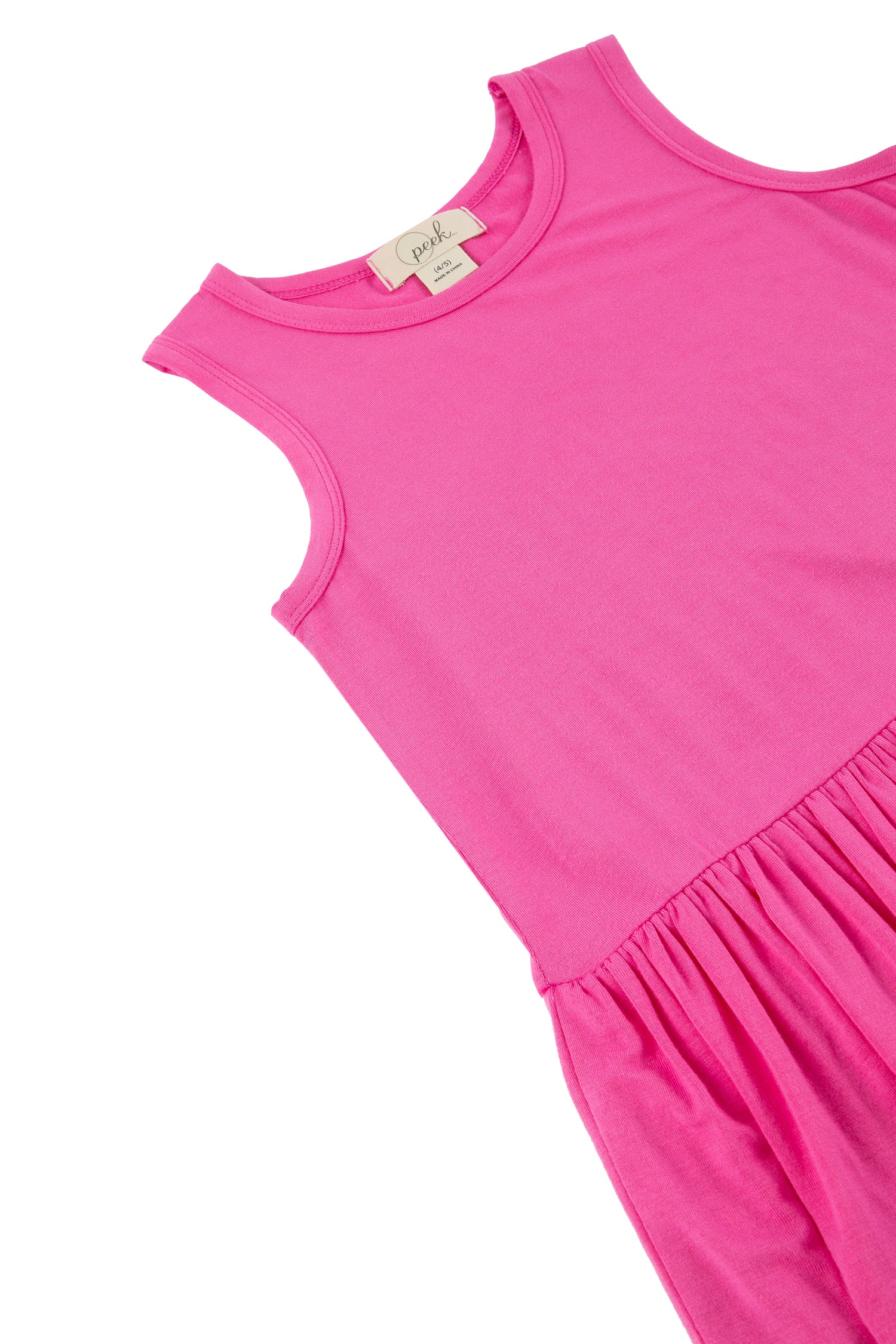 Close up of pink knit dress with frills at the bottom
