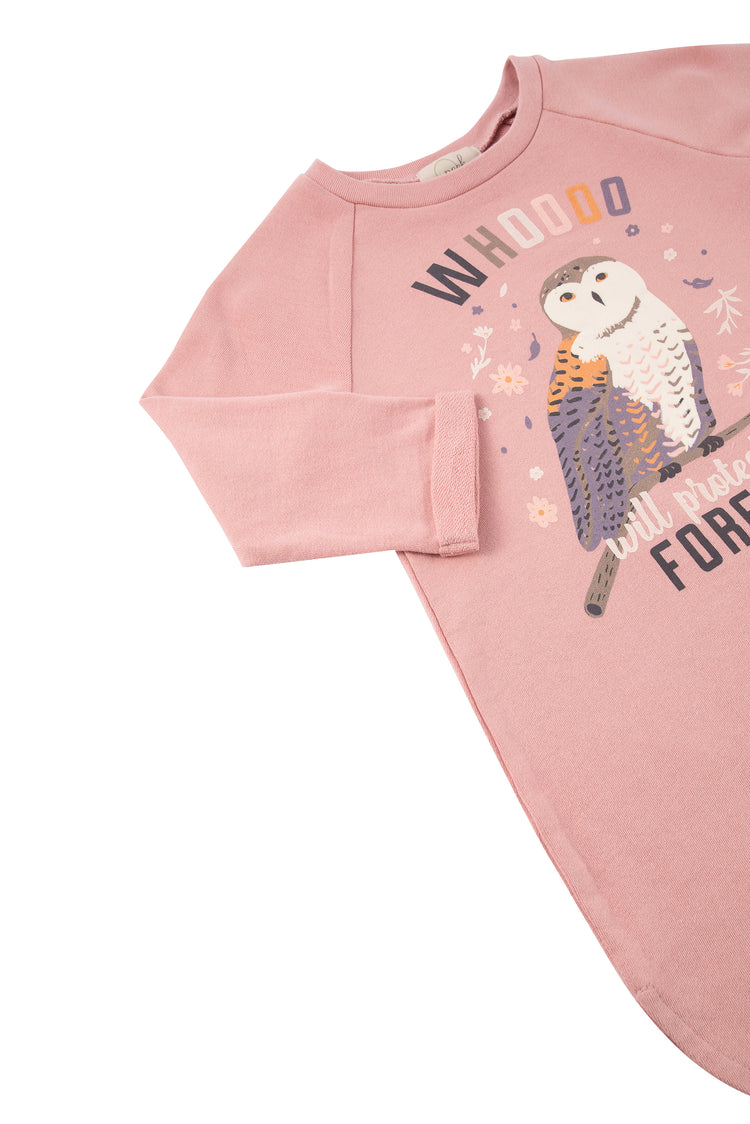 Close up of pink dress with illustrated owl and "whooo will save this planet?" text
