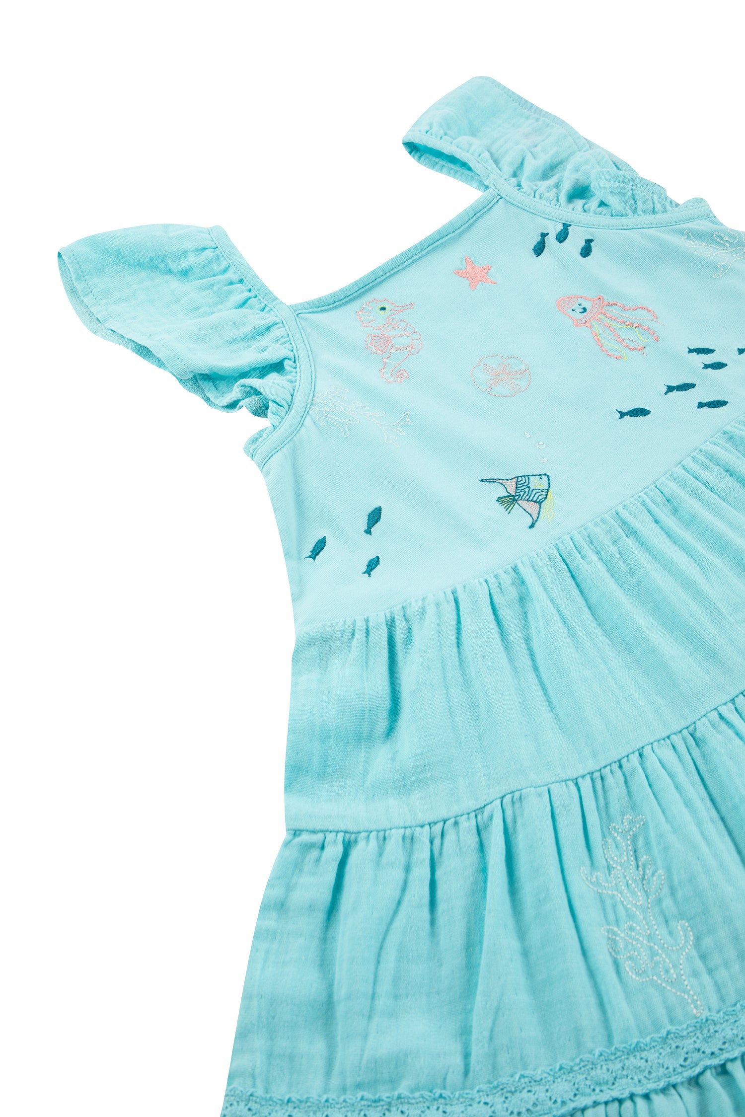 Side  view of blue bottom ruffle dress with sea creature pattern 