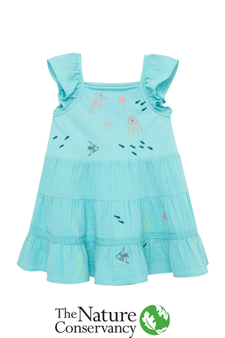 Front view of blue bottom ruffle dress with sea creature pattern 
