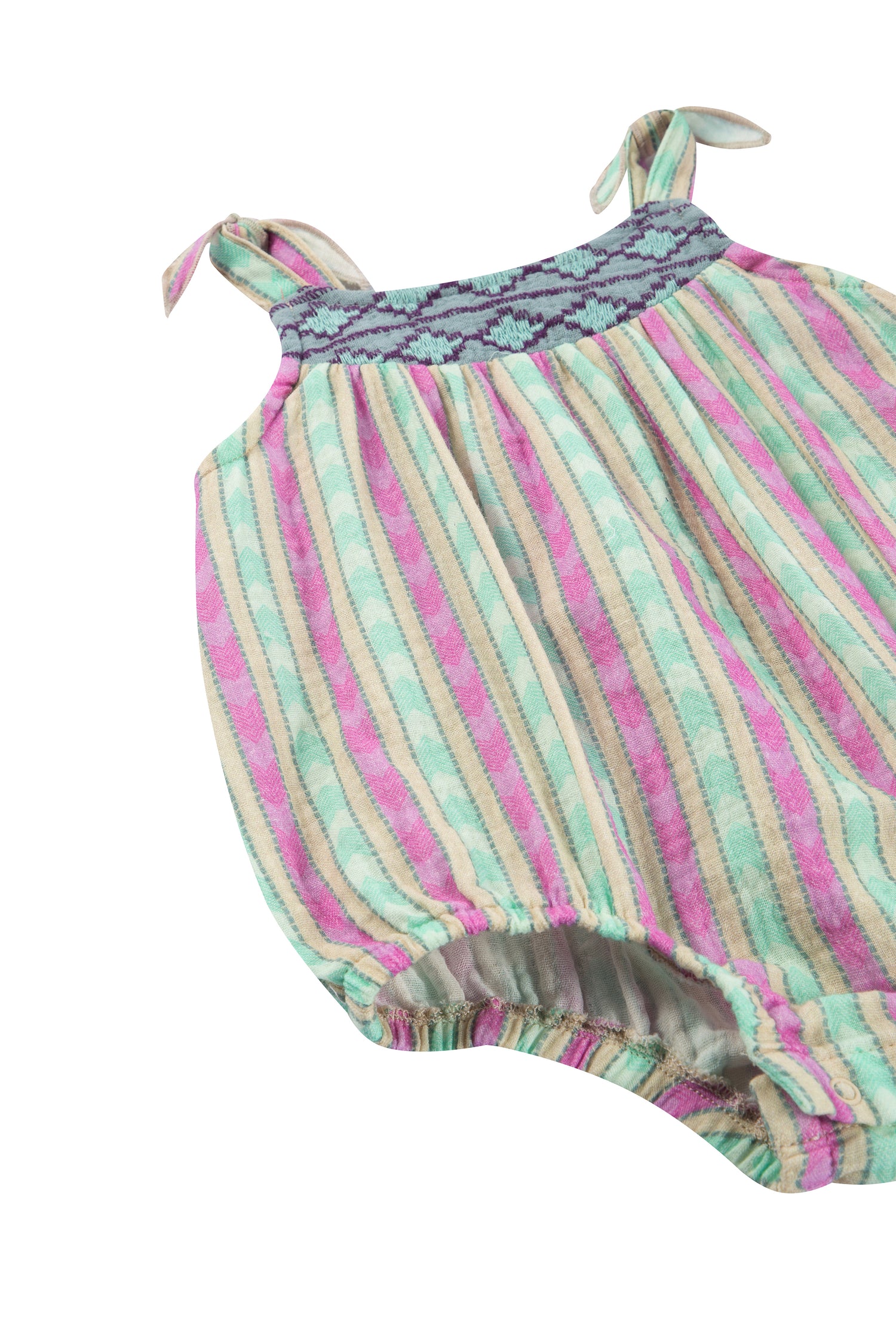 CLOSE UP OF GREEN AND PINK STRIPED GAUZE BUBBLE ROMPER