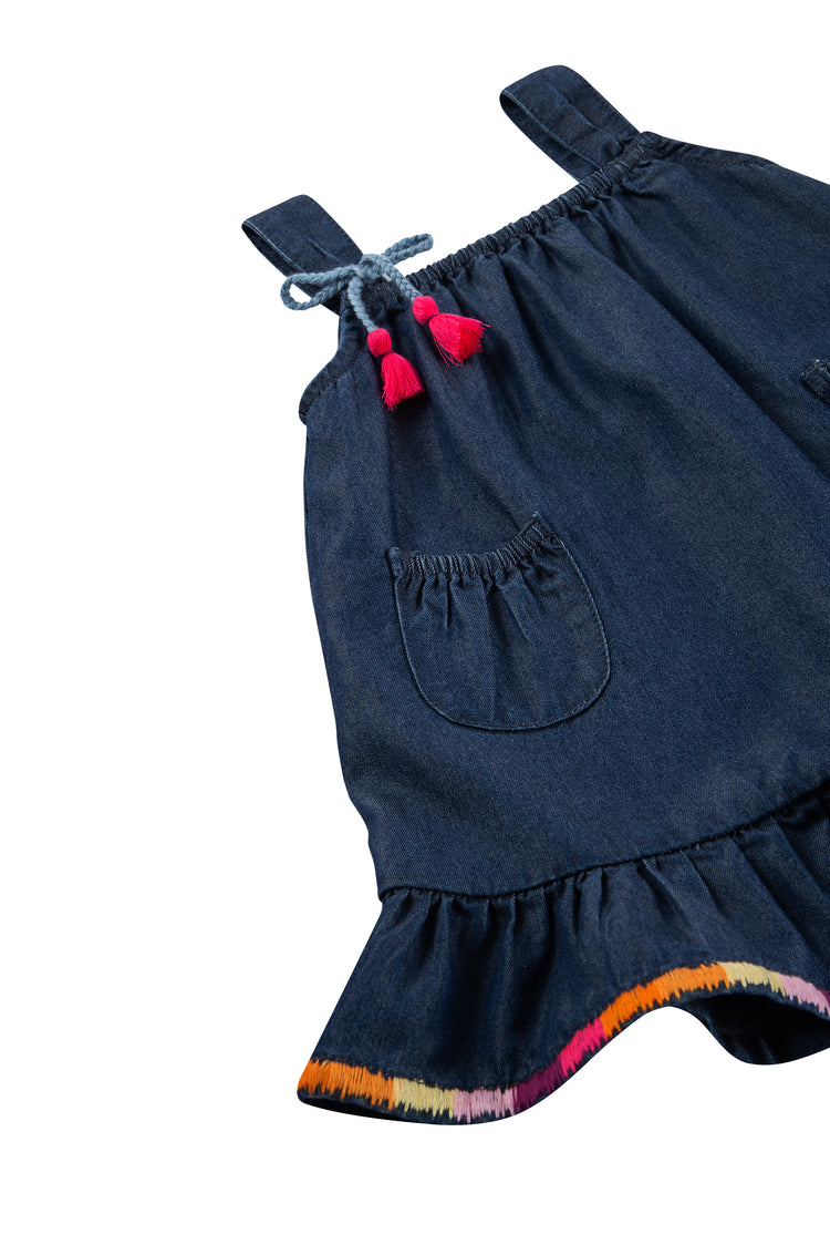 CLOSE UP OF SLEEVELESS DENIM DRESS WITH RAINBOW EMBROIDERY