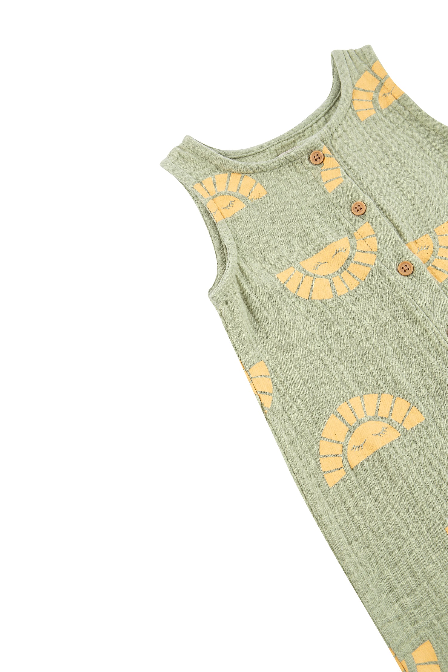 CLOSE UP OF GREEN COVERALL WITH SUN GRAPHICS